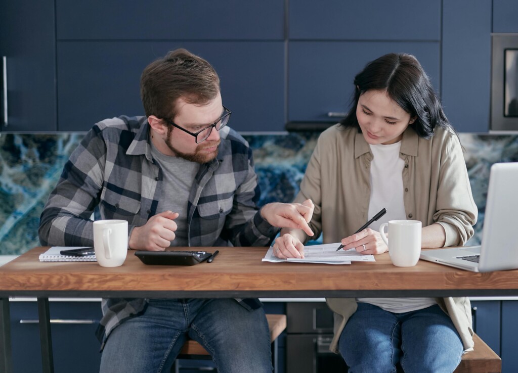 couple looking into credit improvement 